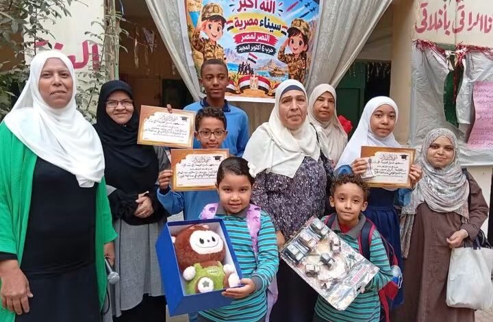 الدكتورة إيمان هاشم وصورة جماعية للمشاركين بالمسابقة